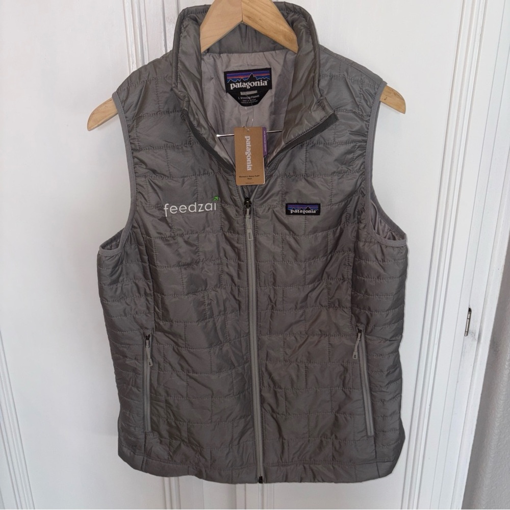 NWT Patagonia Women’s Nano Puff Primaloft Vest Size L Gray Company Logo